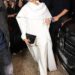 Meghan opted for an all-white ensemble, which she accessorised with a black bag and black shoes, for her 'surprise' visit to Paris Fashion Week in October