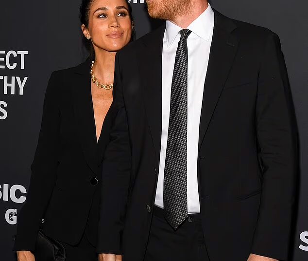 Meghan and Prince Harry are seen together on the red carpet before being handed Humanitarian of the Year awards in New York in October for their online safety campaigns. They have praised a social media ban in Australia and have long advocated for children's online safety and have been critical of AI