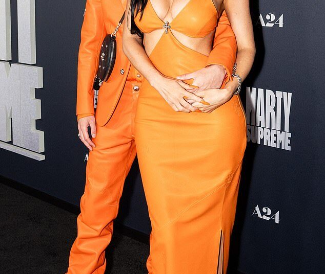 Kylie Jenner, 28, and Timothée Chalamet, 29, made a statement in coordinating orange looks as they brushed aside split rumors at the Marty Supreme premiere in LA earlier this week on Monday (seen above)