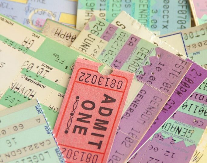A pile of various concert tickets.