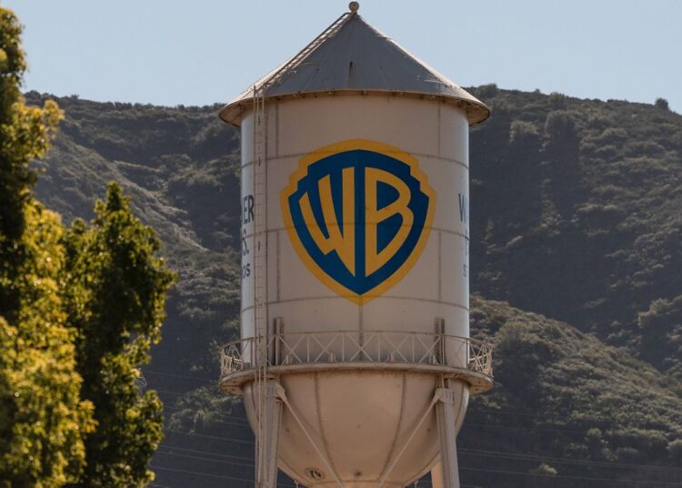 The Warner Bros. water tower is seen at Warner Bros. Studios in Burbank, Calif., Friday, Dec. 5, 2025. (AP Photo/Jae C. Hong)