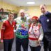 Prince William and Prince George with staff at a homeless shetler
