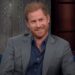 Prince Harry smiling on the Stephen Colbert's Show
