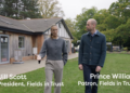 Prince William and Jill Scott walking in a field