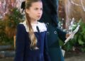Kate's mini-me Charlotte appears to be enjoying wearing her hair in a bow this festive season, as she picked a black design for her mother's Christmas carol concert in London earlier this month