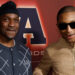 Pusha T and Pharrell Williams pose together at an event, both smiling. Pharrell wears sunglasses and a beige jacket.