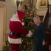 Queen Camilla welcomes Santa to Clarence House in front of a giant Christmas tree