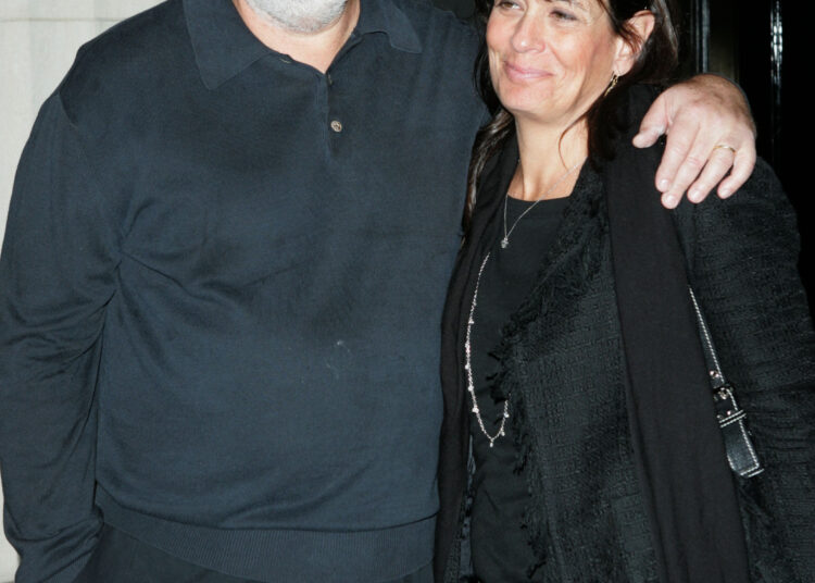 Rob Reiner and wife Michele Singer posing together.