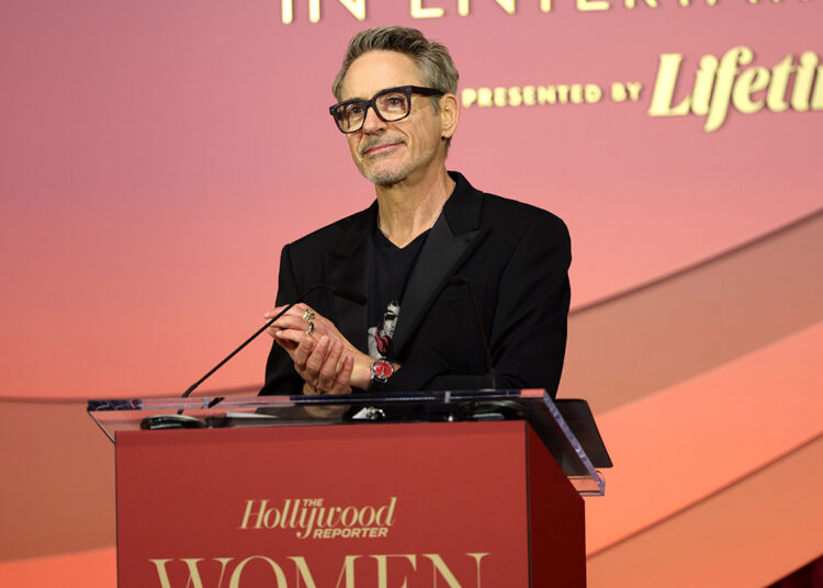 Robert Downey Jr. speaks onstage during The Hollywood Reporter Women In Entertainment Presented By Lifetime at The Beverly Hills Hotel on December 03, 2025 in Beverly Hills, California.