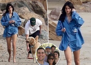 Romy Reiner looks solemn on beach walk after parents' Rob and Michele's murders