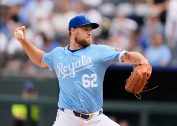 FILE - Kansas City Royals relief pitcher Jonathan Bowlan throws during the seventh inning of a baseball game against the against the Toronto Blue Jays, Sunday, Sept. 21, 2025, in Kansas City, Mo. (AP Photo/Charlie Riedel, File)