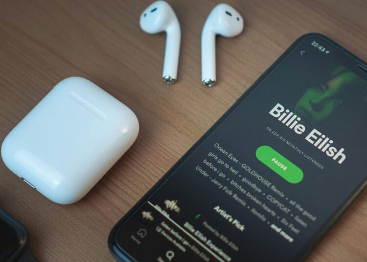 Spotify Wrapped arrives after Apple Music Replay – with a new party feature | Spotify app open with Billie Eilish on-screen