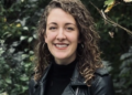 Spruce Elementary music teacher earns national appointment, publishes new book