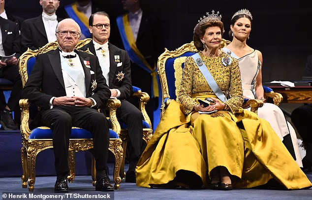 King Carl Gustaf, Prince Daniel, Queen Silvia and Crown Princess Victoria at the Nobel Prize ceremony at the Concert Hall in Stockholm