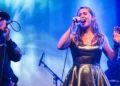 Frost School faculty member Raina Murnak sings with Auditory Nerve at the International AI Song Contest in Amsterdam. Photo by Claudia Hansen.