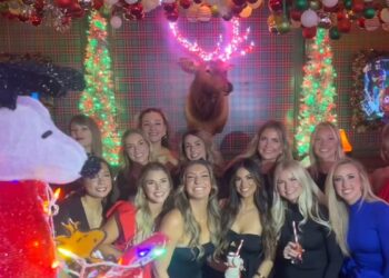 Taylor Swift with the Chief WAGs at a holiday party