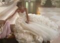 Taylor Swift has sparked speculation about the designer of her wedding dress after rumours that she met with Sarah Burton while in London. Pictured while filming I Bet You Think About Me in 2021