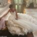 Taylor Swift has sparked speculation about the designer of her wedding dress after rumours that she met with Sarah Burton while in London. Pictured while filming I Bet You Think About Me in 2021
