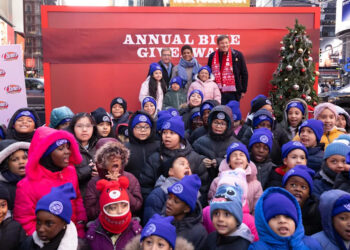 Todd Graves and Peter Billingsley at Times Square with dozens of kids