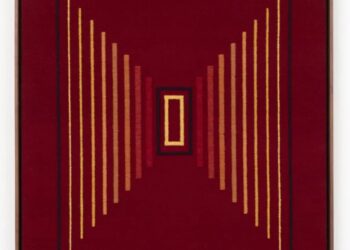 Geometric textile art in shades of deep red by Porfirio Gutiérrez.