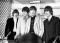 The Beatles answer questions regarding their Shea Stadium concert at a press conference on August 23, 1965 in New York City. (Michael Ochs Archives/Getty Images)