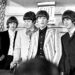 The Beatles answer questions regarding their Shea Stadium concert at a press conference on August 23, 1965 in New York City. (Michael Ochs Archives/Getty Images)