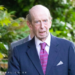 Prince Edward, the Duke of Kent wears a dark jacket and purple tie