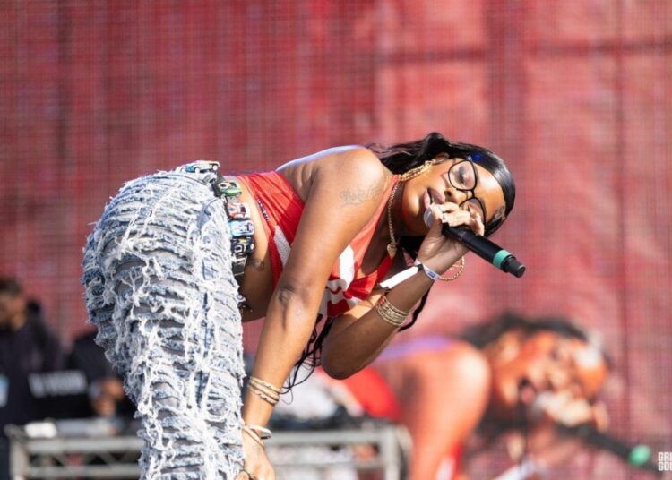 Bosslady at Top Dawg Entertainment TDE Christmas Charity Concert and Community Celebration