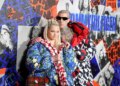 Travis Barker (R) is father to Alabama (L) and son Landon with ex-wife Shanna Moakler. He is also stepdad to Moakler's daughter, Atiana De La Hoya, and his current wife Kourtney Kardashian Barker's children — Mason, Reign, and Penelope — whom she shares with ex Scott Disick.