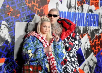 Travis Barker (R) is father to Alabama (L) and son Landon with ex-wife Shanna Moakler. He is also stepdad to Moakler's daughter, Atiana De La Hoya, and his current wife Kourtney Kardashian Barker's children — Mason, Reign, and Penelope — whom she shares with ex Scott Disick.