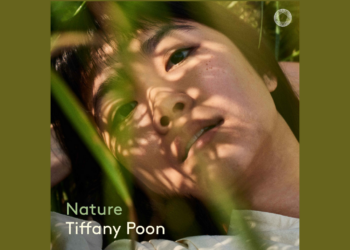 A person lies among green plants, with shadows of leaves across their face. The text Nature Tiffany Poon appears at the bottom left.