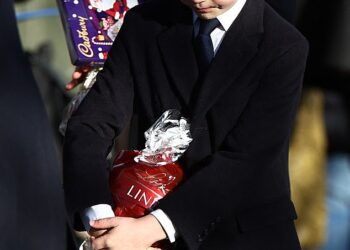 Prince Louis couldn't contain his glee after a royal fan gave the seven-year-old a massive tub of Lindor chocolates after the Christmas church service at Sandringham
