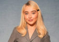 Sabrina Carpenter wears grey blazer at Dior fashion show.