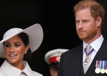 Prince Harry and Meghan Markle have been 'clinging' to their children’s royal titles for key personal reasons.MEGA
