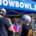Two guests participating in a Collision Camp raffle