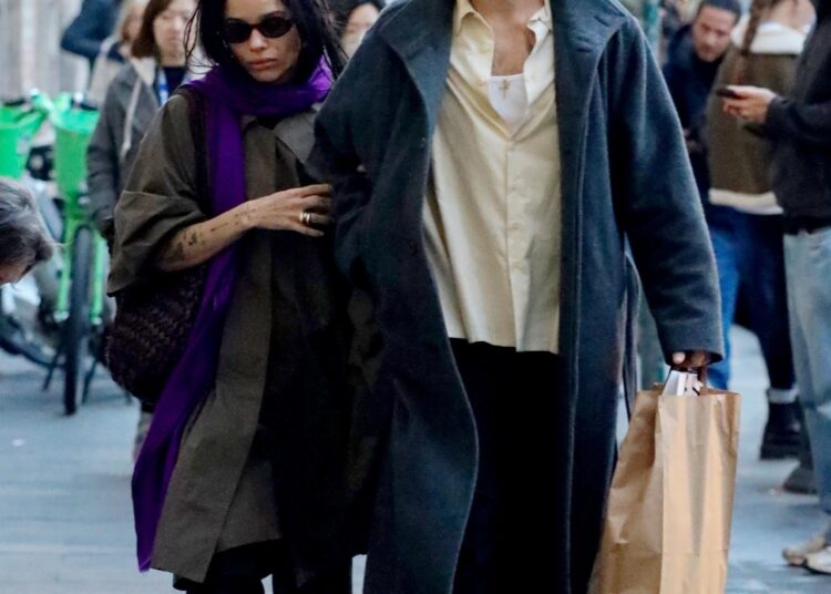 Zo&euml; Kravitz and Harry Styles spent the week before Christmas in Rome wearing coordinating couple's winter coat