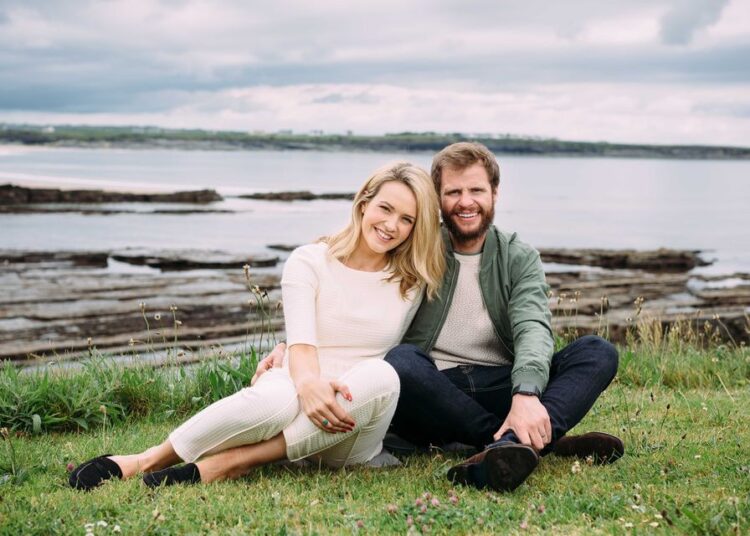 Aoibhín Garrihy and John Burke on the cliffs at Spanish Point in Co Clare. Photo: Eamon Ward