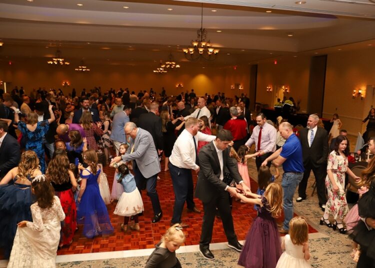 a room of people dancing