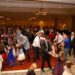 a room of people dancing