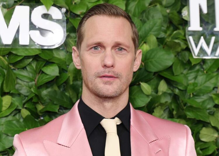 Alexander Skarsgård rocks a sexy singlet in steamy new pics