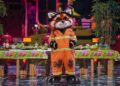 masked singer red panda performing