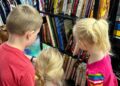 Kids looking at books