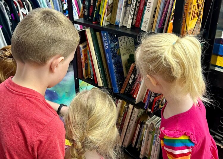 Kids looking at books