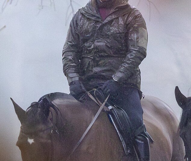 Andrew Mountbatten-Windsor still enjoys riding, pictured in the torrential rain close to Royal Lodge, but is said to spend more time watching TV or playing video games