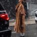 *exclusive* new york, ny bella hadid was spotted arriving at a photoshoot in nyc on a snowy afternoon. wearing a mango faux fur coat, the model was seen catching snowflakes with her tongue in the blizzard conditions. she wore her hair in rollers as she arrived for a shoot in midtown. pictured: bella hadid backgrid usa 19 january 2026 usa: +1 310 798 9111 / usasales@backgrid.com uk: +44 208 344 2007 / uksales@backgrid.com *uk clients pictures containing children please pixelate face prior to publication*