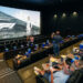 Guests prepare to watch Formula One "F1" The Movie preview screening at the CMX Daytona 12 Luxury Theatres at One Daytona, Monday, June 23, 2025.