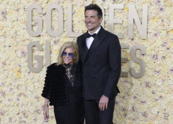 Gloria Campano and Bradley Cooper. 81st Annual Golden Globe Awards
