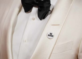 Celebrities wear pins protesting ICE on the Golden Globes red carpet