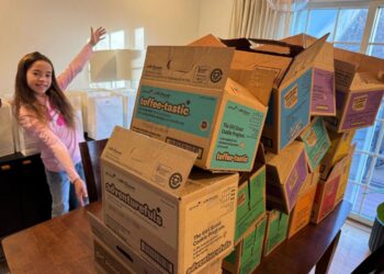 Denville student sings her way to Girl Scout cookie success