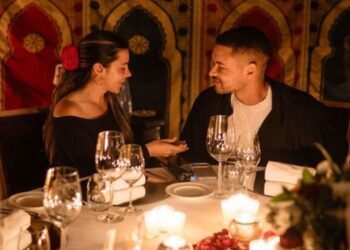 Melanie Lopes and Steven Bartlett at a candlelit supper following their engagement